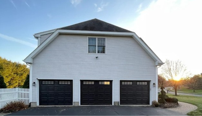 Three black garage doors